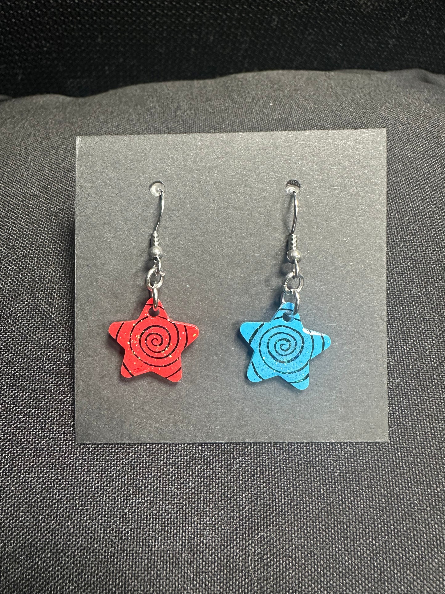 Contrasting Red and Blue Star Spiral earrings