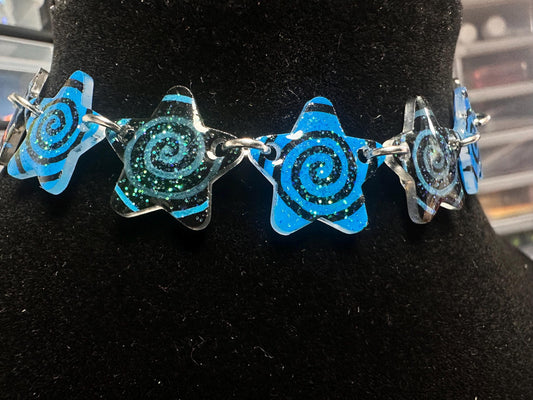 blue and black swirl star choker necklace