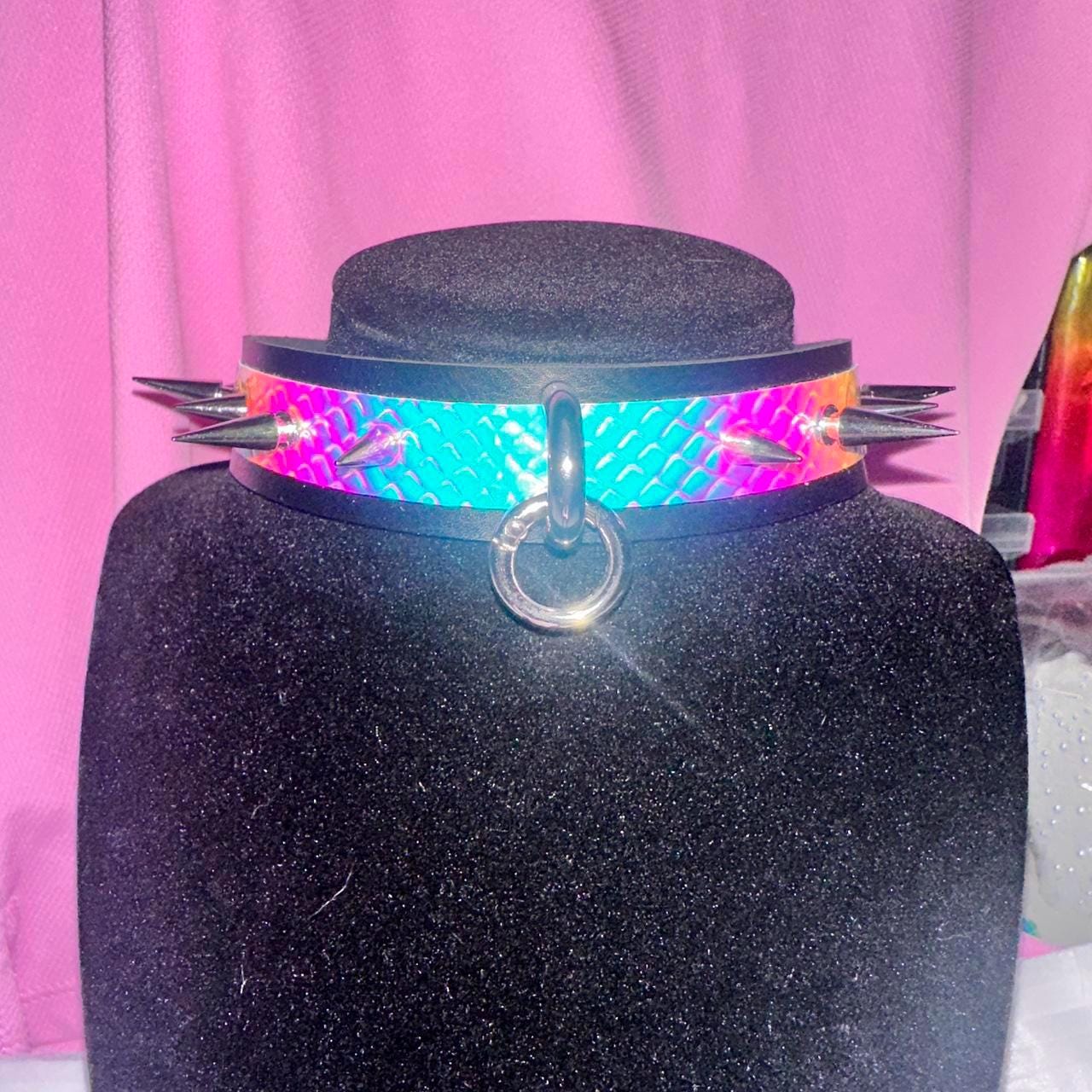 Iridescent spiked collar with silver ring and black band