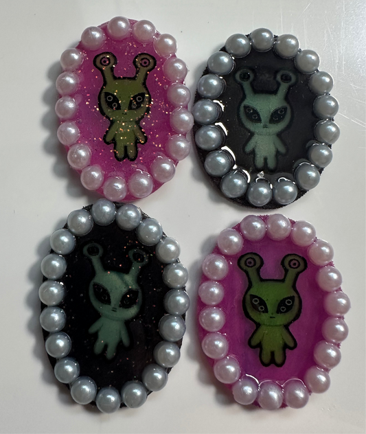 pearl accented alien brooch