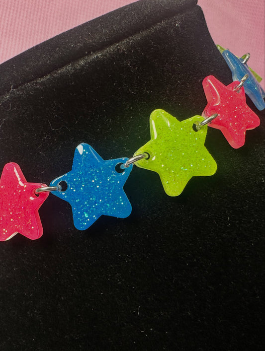 pink, green, and blue star choker necklace